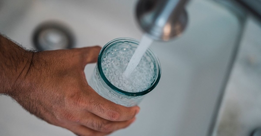 Water cup being filled