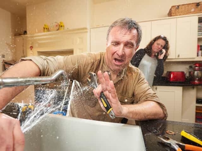Man getting sprayed with water
