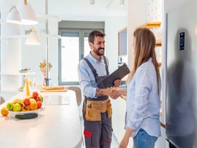 Technician greeting woman